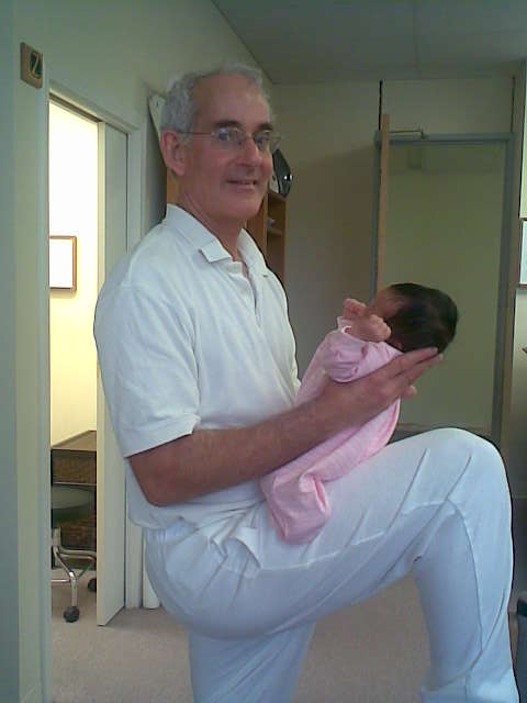 Dr. Michael Joseph and baby's First adjustment  Headache, Back Pain, Neck Pain,  Arm Pain, Hand Pain, Leg Pain, Knee Pain, Foot Pain, Chiropractic Pain Relief in Marin- San Rafael, CA